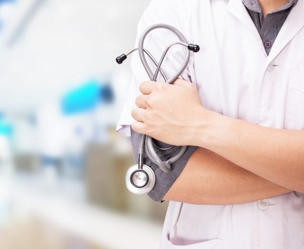 A doctor holding a stethoscope